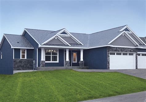 blue house with gray metal roof|houses with blue roofs pictures.